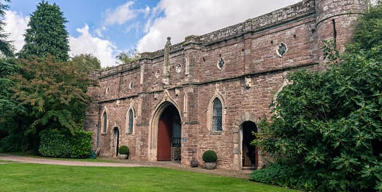 Bolitree Castle inner wall with gate and landscaping